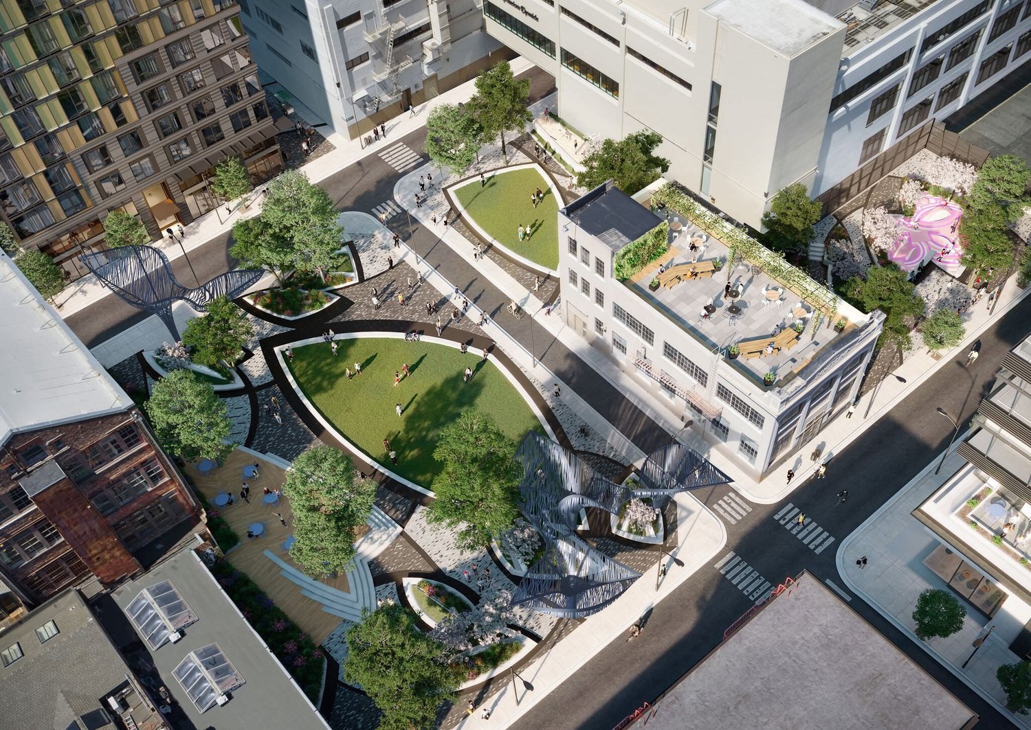 Aerial view of the property showing a rooftop seating area and a sculptural park.