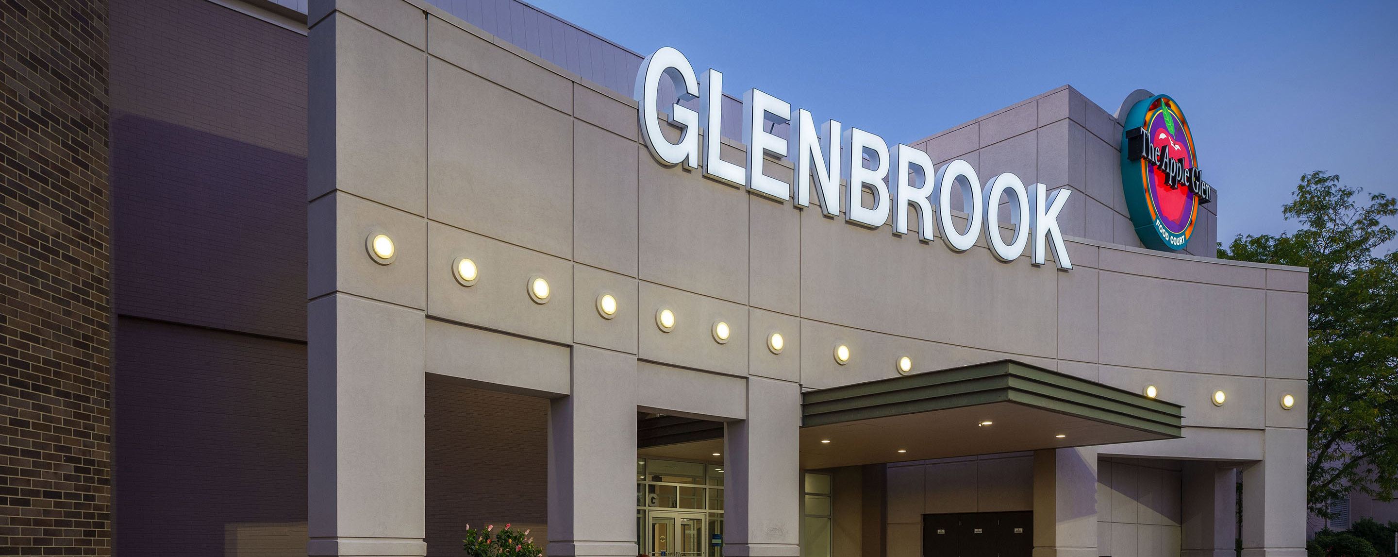 A sign reading The Apple Glen Food Court is attached to a building that says Glenbrook.
