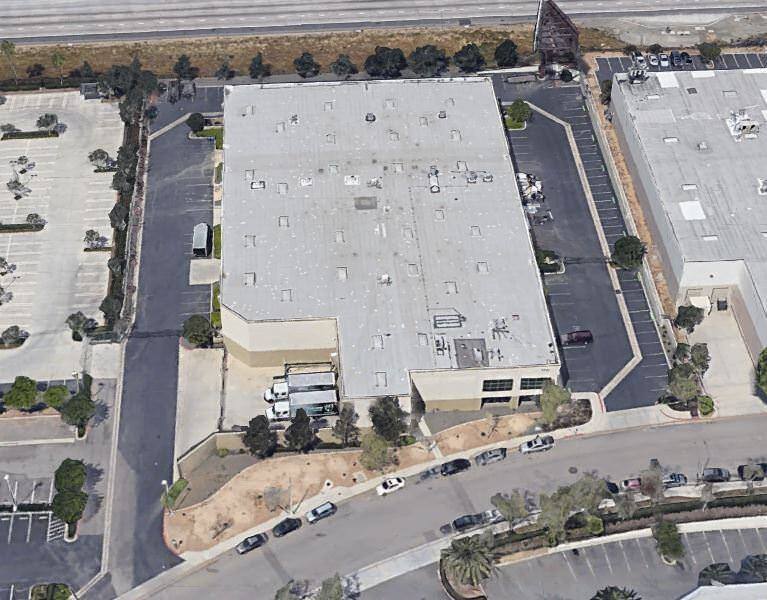 Aerial view of 1771 N Delilah Street, two large warehouses with parking.